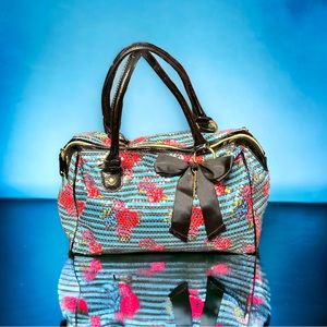 Betsey Johnson blue sequence purse with large accent bow.